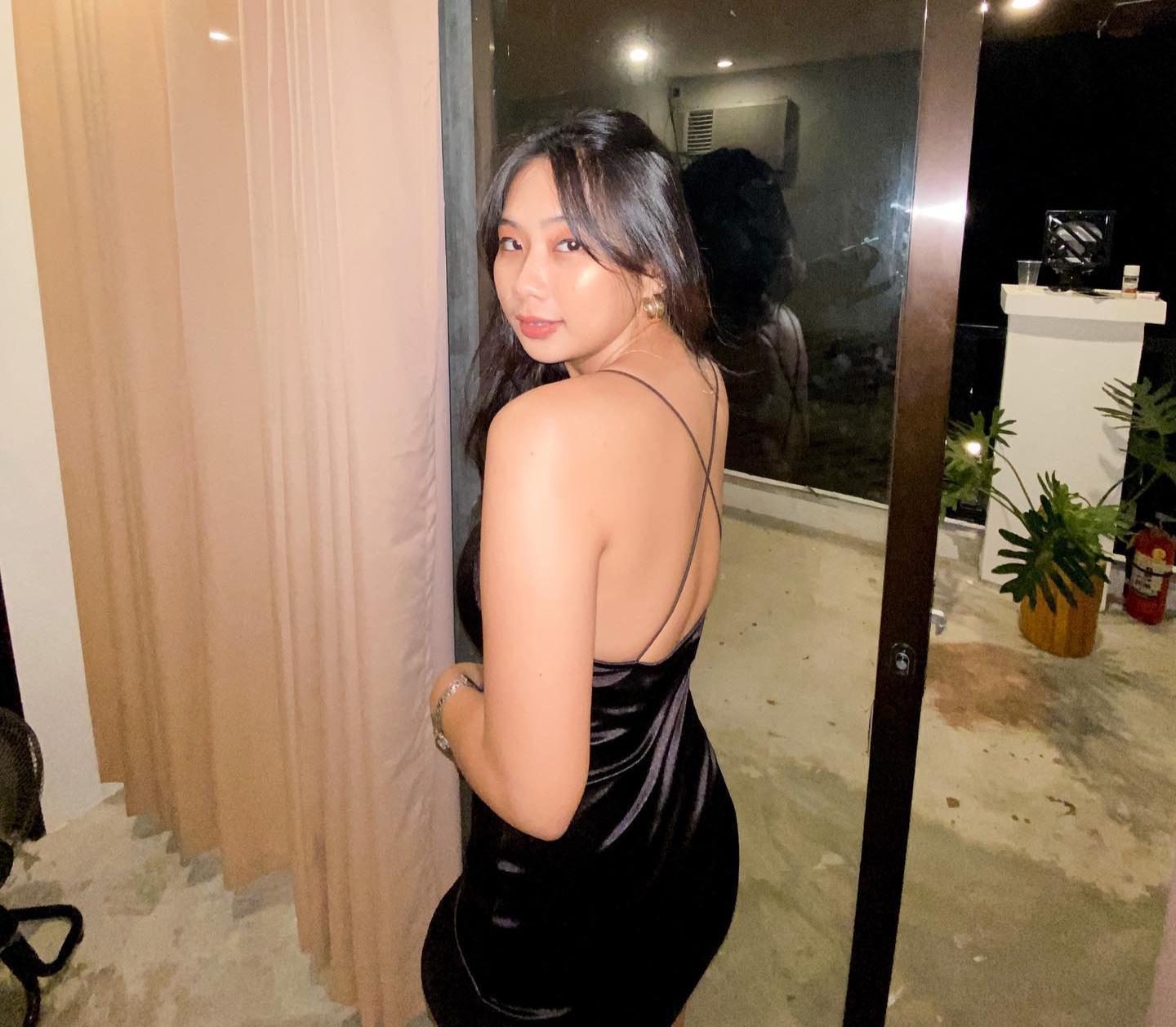 Justine, a beautiful Filipina woman in a black bikini, white top with a skirt, and a black dress.