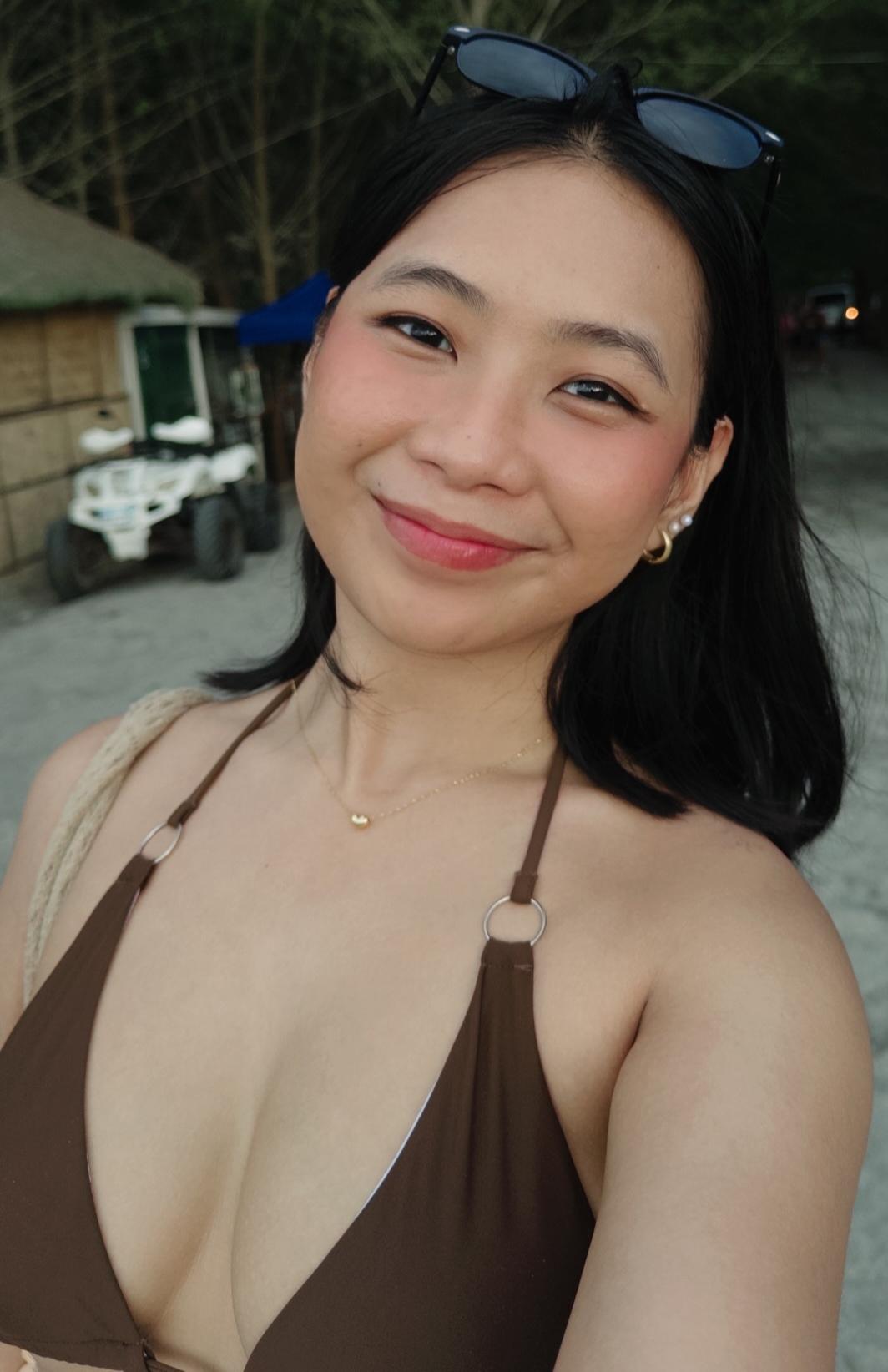 Justine, a beautiful Filipina woman in a black bikini, white top with a skirt, and a black dress.
