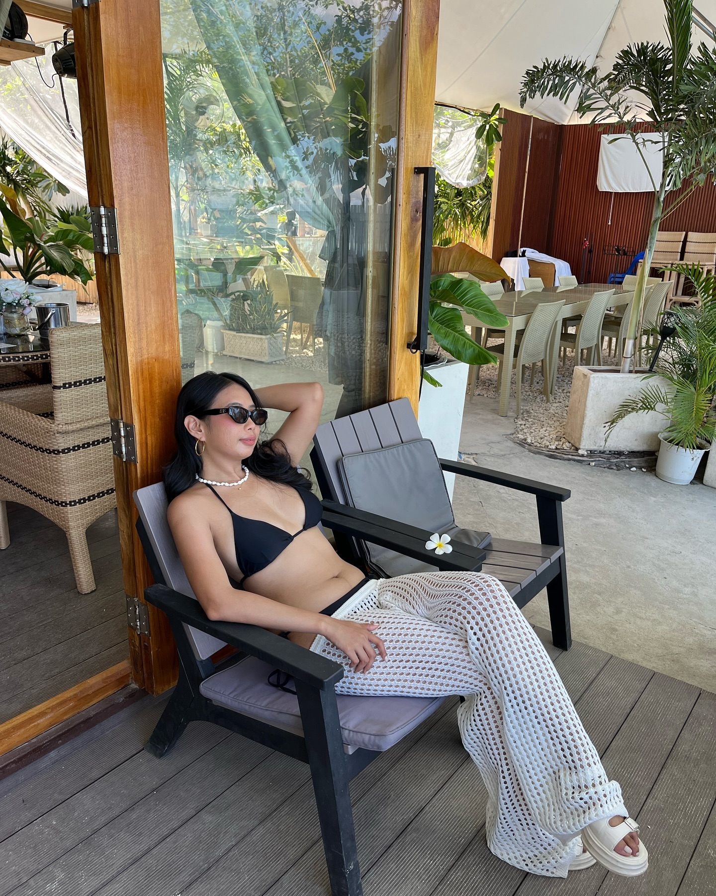 Justine, a beautiful Filipina woman in a black bikini, white top with a skirt, and a black dress.