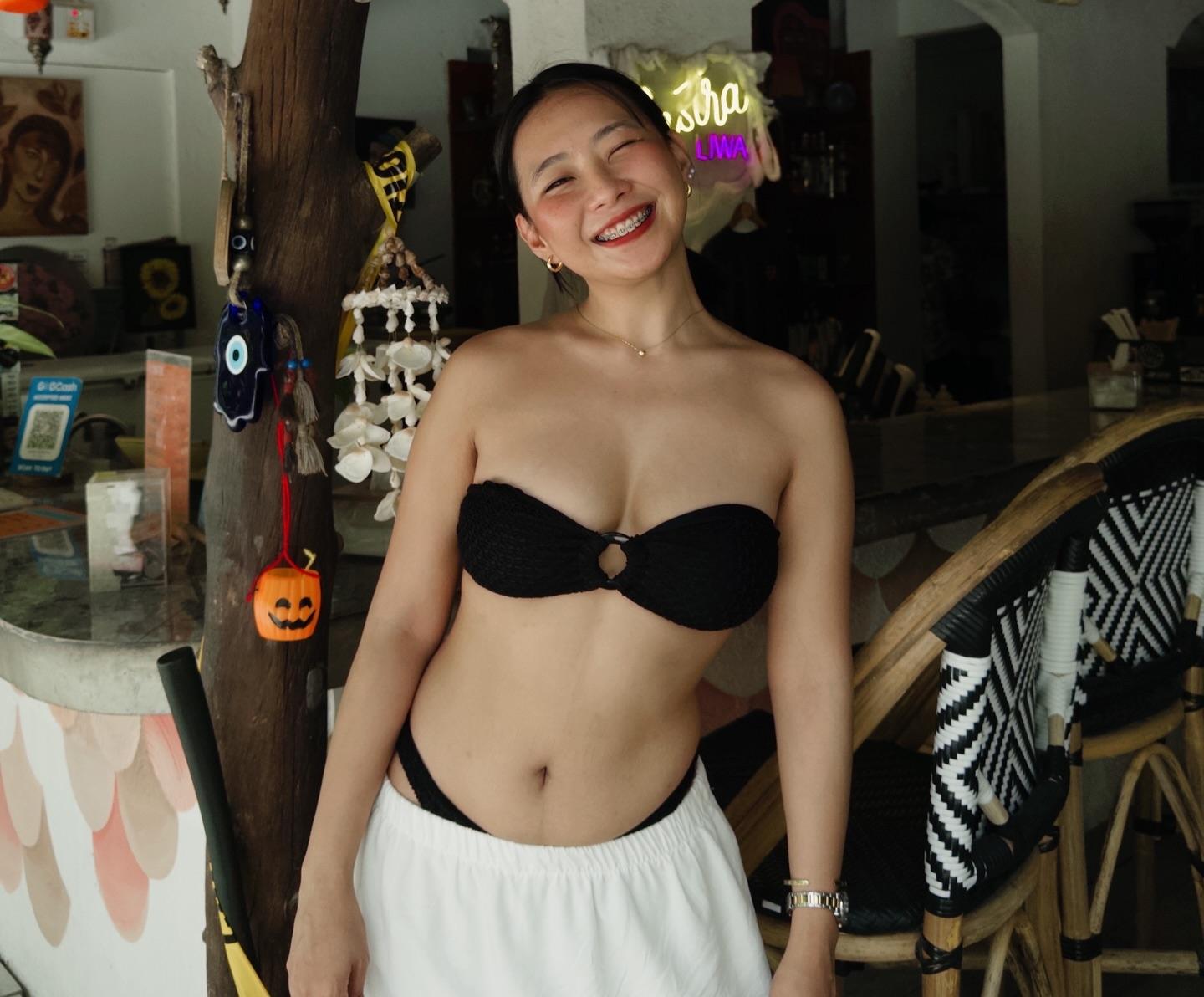 Justine, a beautiful Filipina woman in a black bikini, white top with a skirt, and a black dress.