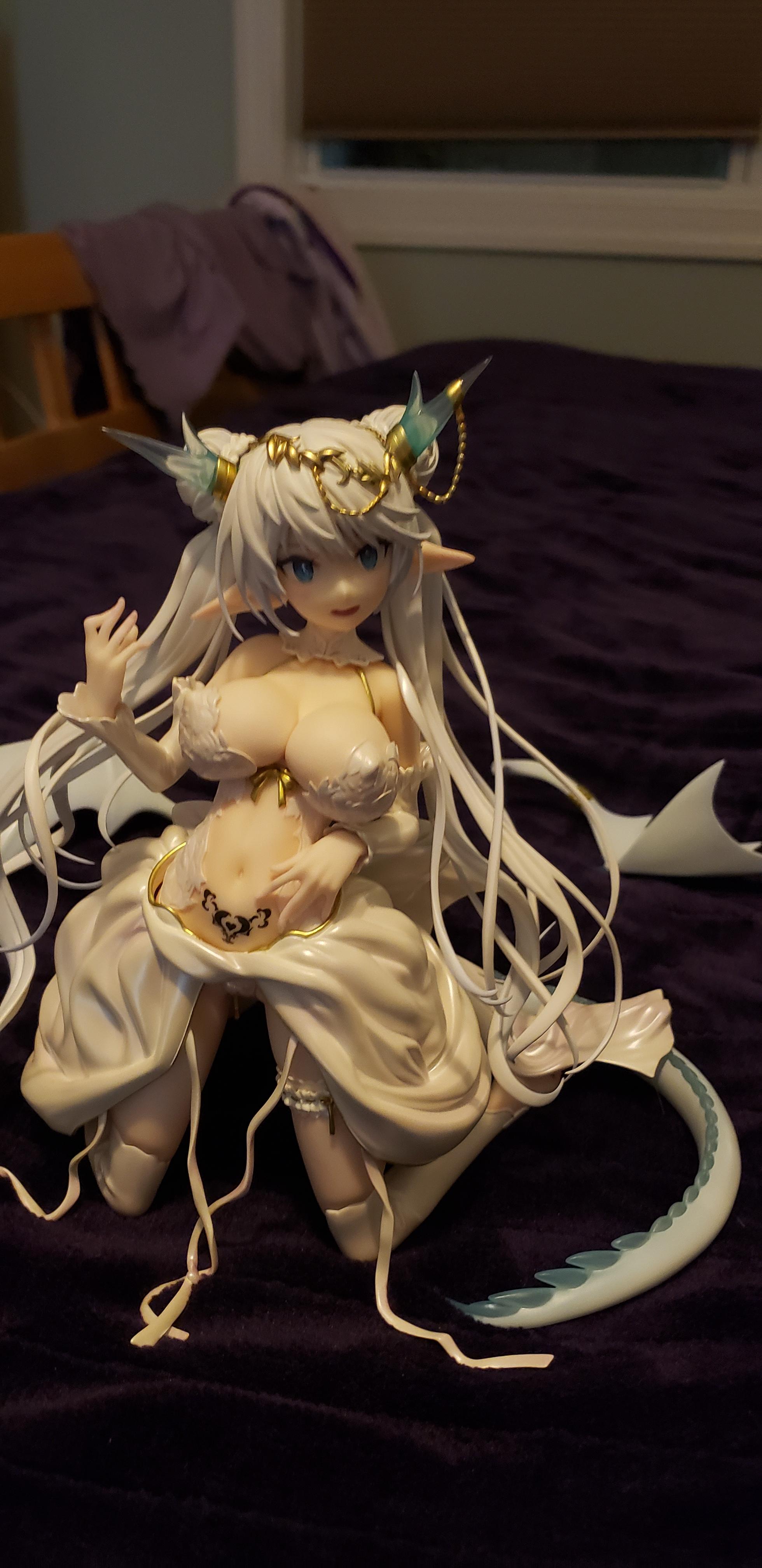 Albedo from Overlord anime figure, back view showing white twin-tails, large bow, and wings