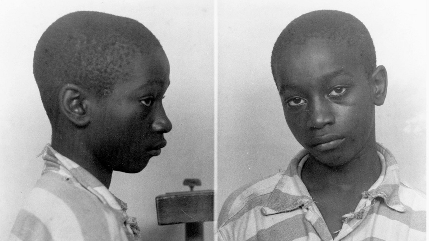 George Stinney Jr. in a striped prison uniform and booking records from the South Carolina Penitentiary