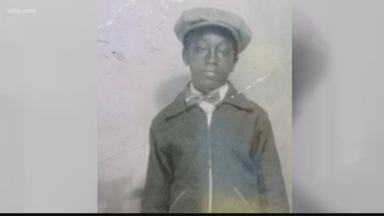 George Stinney Jr. in a striped prison uniform and booking records from the South Carolina Penitentiary