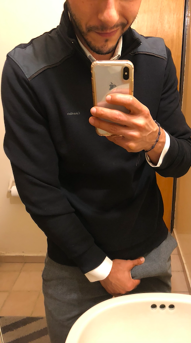 Muscular Arab DILF in Calvin Klein underwear and a white shirt posing for mirror selfies in a bathroom