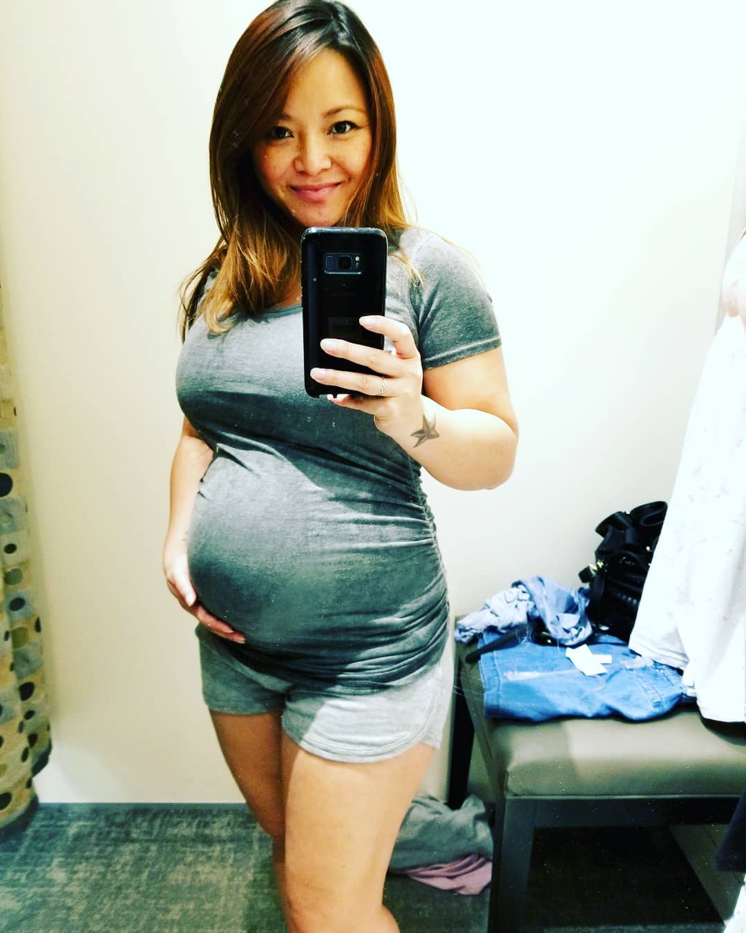 Pregnant Tila Tequila and other pregnant women, including a blonde in a white maternity dress and a woman in a pink bikini