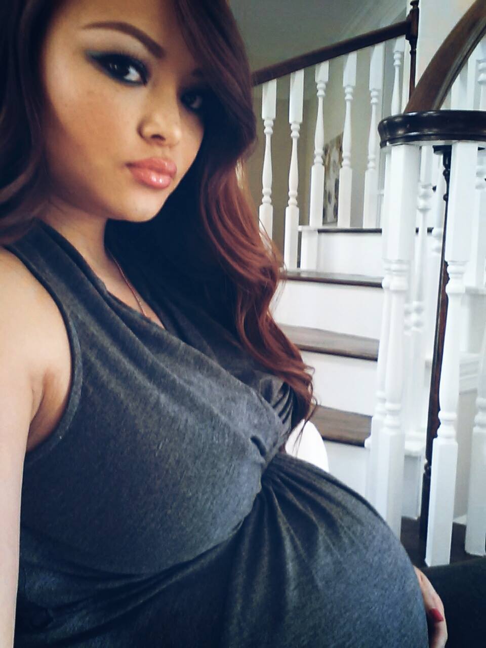 Pregnant Tila Tequila and other pregnant women, including a blonde in a white maternity dress and a woman in a pink bikini