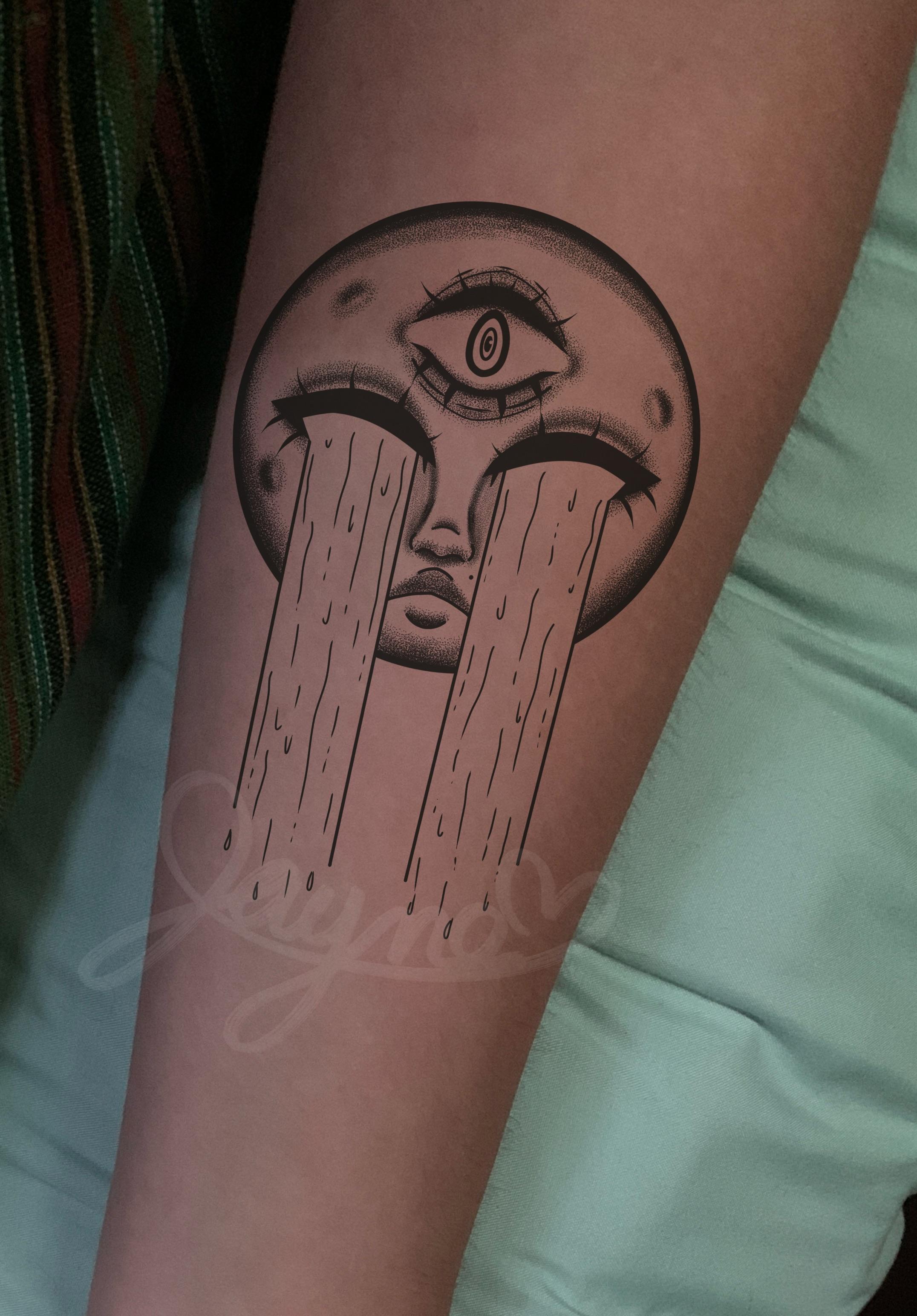 Tattoo design inspiration featuring a crying moon with a third eye, shown as both an oil painting and an arm tattoo