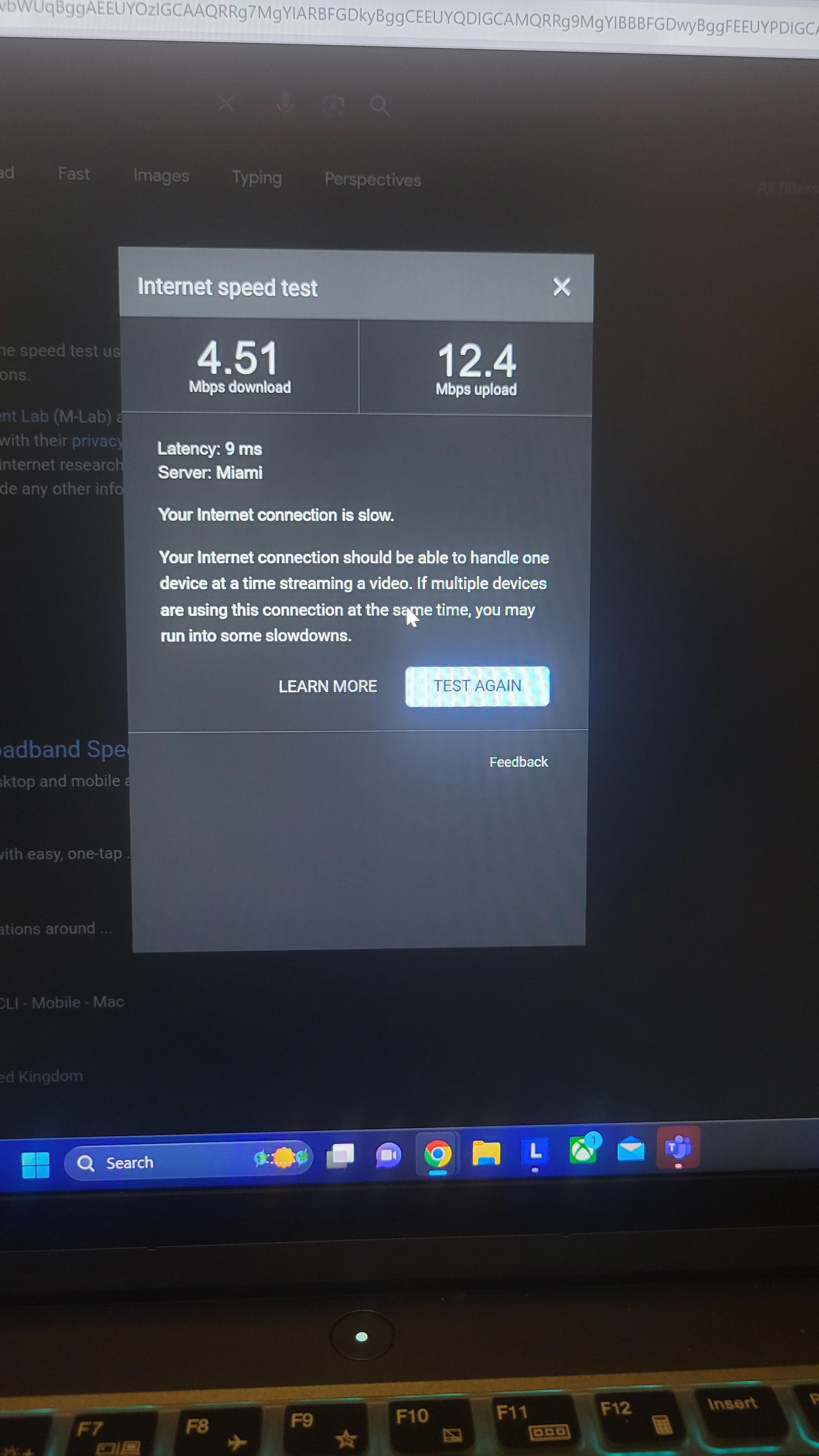 Laptop internet speed test results showing a fast 448 Mbps connection versus a slow 4.51 Mbps connection.