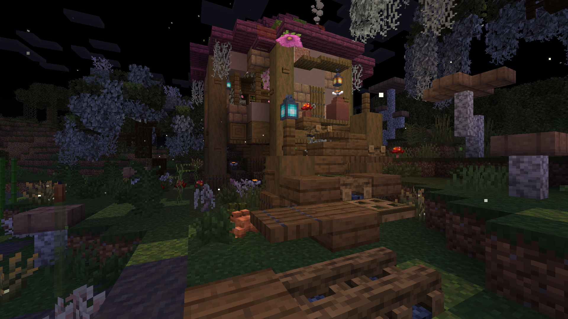 Cute Minecraft swamp huts with cherry blossom trees and lanterns at night