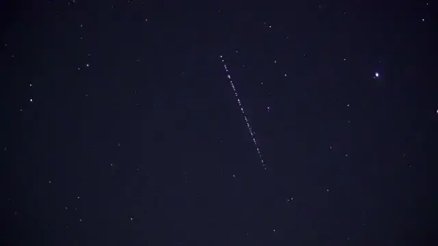 A train of Starlink satellites in the night sky