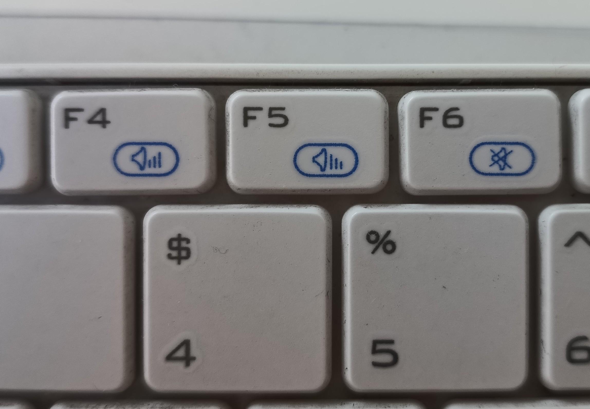 Volume up/down keys are in reversed order on this keyboard. | Scrolller