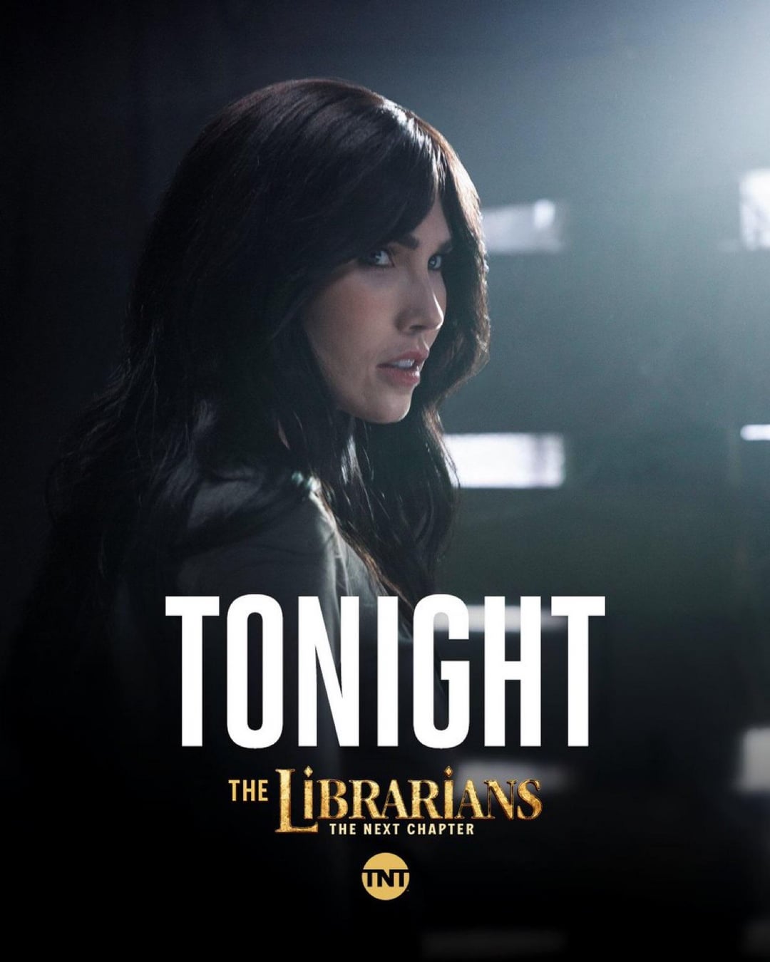 Jessica Green with long dark hair and pale skin in a close-up for The Librarians: The Next Chapter