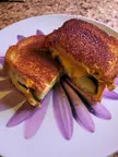 Grilled cheese with sharp cheddar and pickles on brioche with caramelized brown sugar on the crusts. My favorite way to have a grilled cheese!