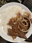 [Homemade] Dominican Bistec Encebollado with rice.