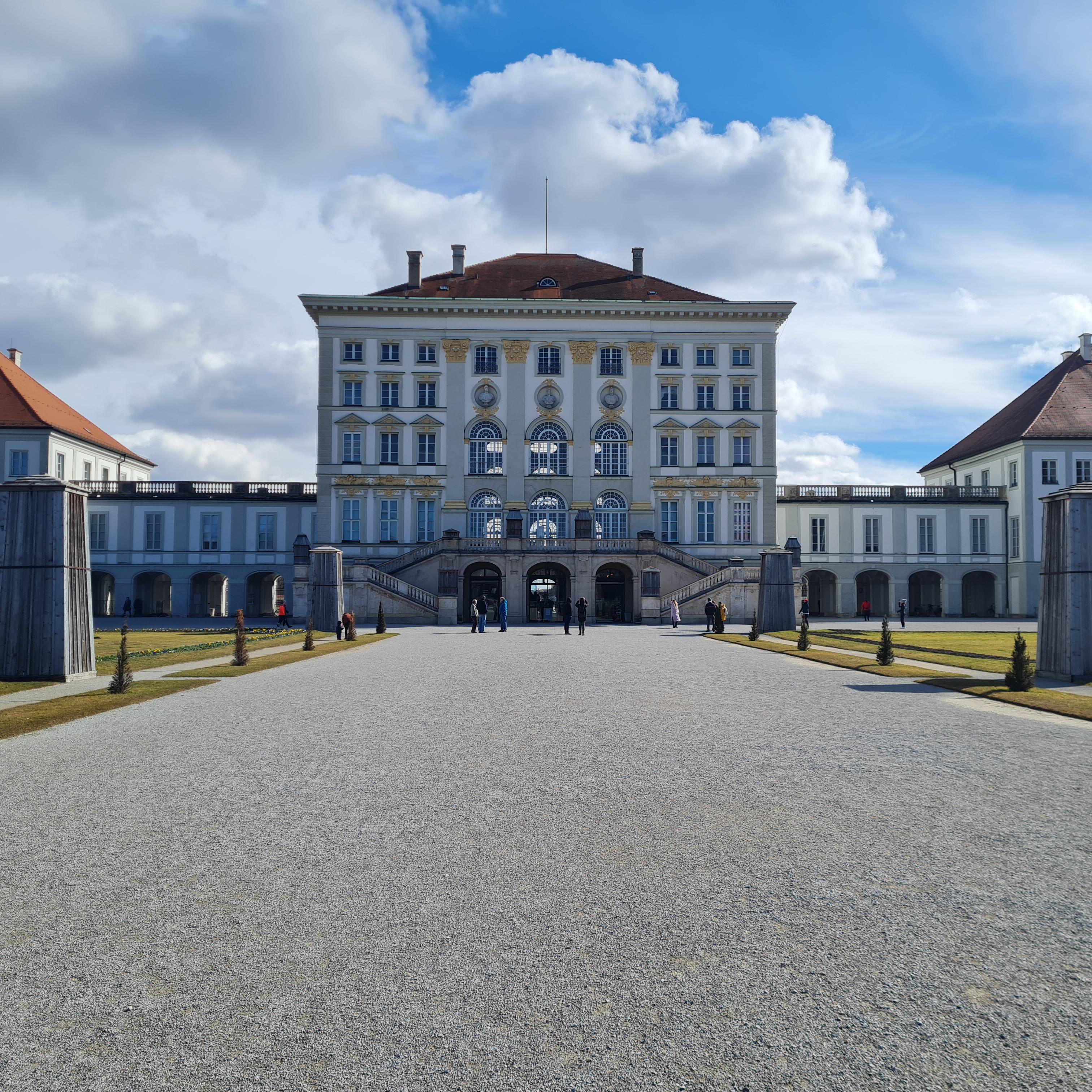 Munich landmarks including the New Town Hall, Glyptothek, Karlstor, and Allianz Arena with groups of people