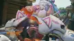 D.Va in her white and pink outfit using her ultimate ability in a futuristic Overwatch city map