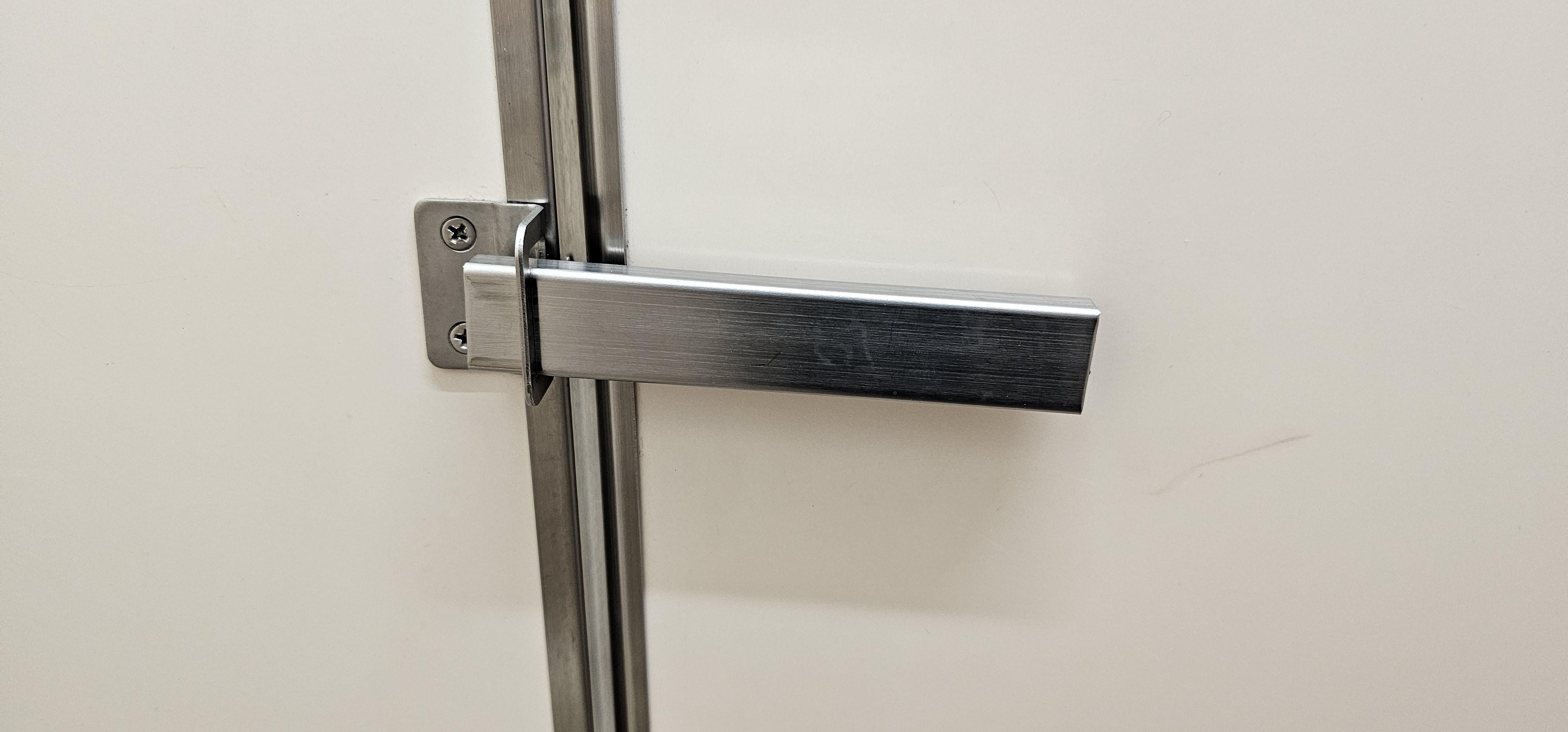 Minimalist toilet door lock in Tokyo
