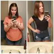 Woman with brown hair in mirror selfies wearing an orange t-shirt and a black v-neck with denim shorts