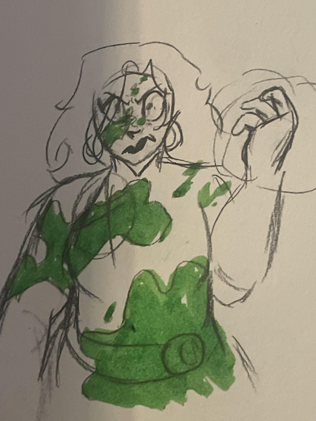 Invisible Woman from Fantastic Four with curly blonde hair and green splatters on her face and belted costume