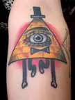 Bill Cipher tattoo on forearm