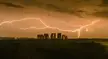 The Gods speak over Stonehenge at midnight.