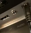 Hey! So I recently got a Koorui monitor and would love to connect my soundbar to it, however I have an optical cable with my soundbar and my Koorui has the port shown in the picture. Should I buy an adapter of some sort? Also what kind of cable goes into this port?