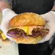 Brisket burger. Brisket, ground beef, American cheese, a little pimento cheese, burger sauce, red onion, pickle. Incredible bun.