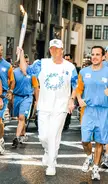 Olympic torch carrier in 2004