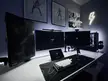 black and white, triple monitor setup
