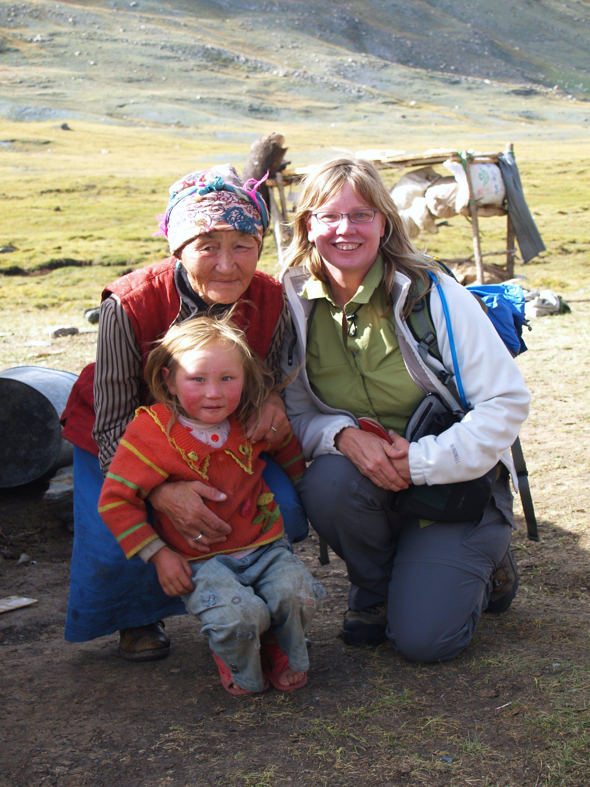 Blonde little girl with her grandmother, Mongolia