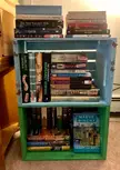 book porn in hand-painted crate shelves 🥰