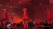 Beyoncé dancers in red outfits and cowboy hats performing on a concert stage during Big 3 ATL night 3