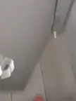 Slim man in a striped shirt fapping in a public restroom mirror