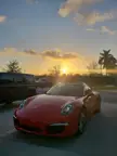Nice car, nice sunset, nice day.