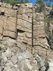 Natural quarry, granite crumbling on the edge of the baltic sea