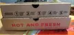 This pizza box has instructions on how to reheat the pizza.