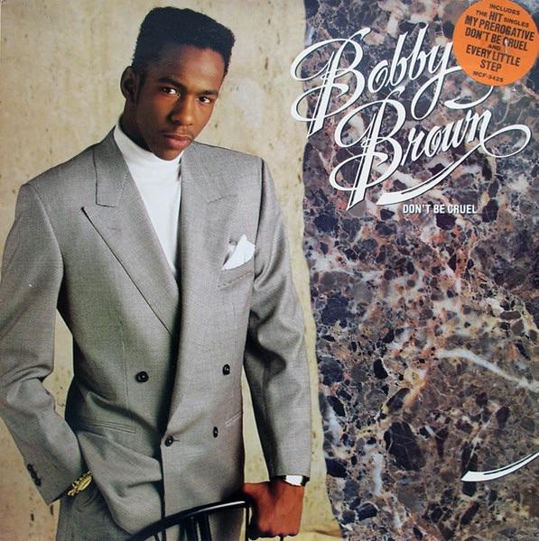Bobby Brown in streetwear, formal suits, and with a woman in a red dress