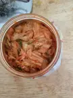 I accidentally left an unopened kimchi container inside a dry ice package in a box for about six days, outside, is it dangerous?