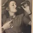 My babushka, in her twenties, downing vodka straight from the bottle. Soviet Union, late 1950s