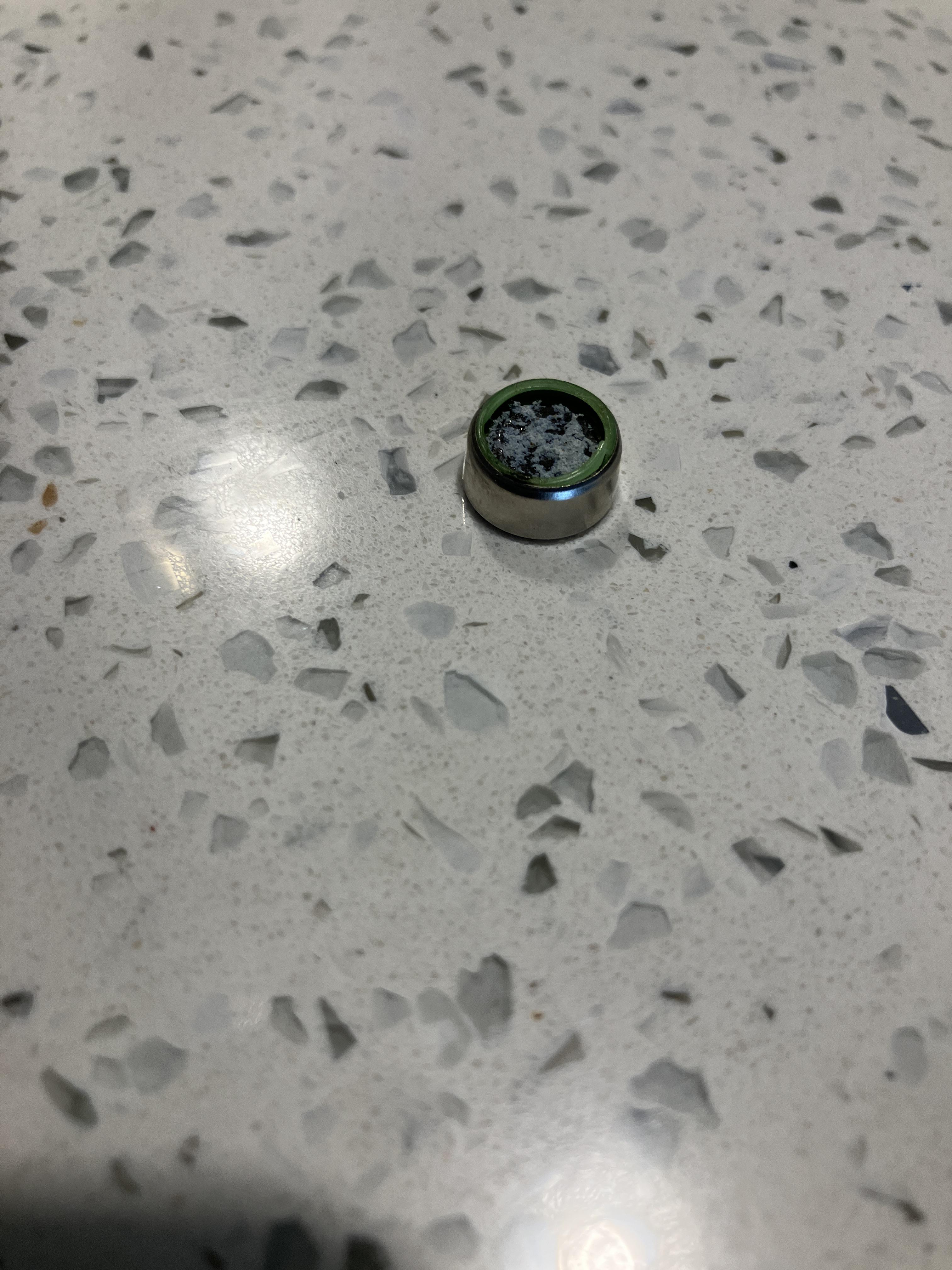 Button cell battery unexpectedly exploded, here's what's inside | Scrolller