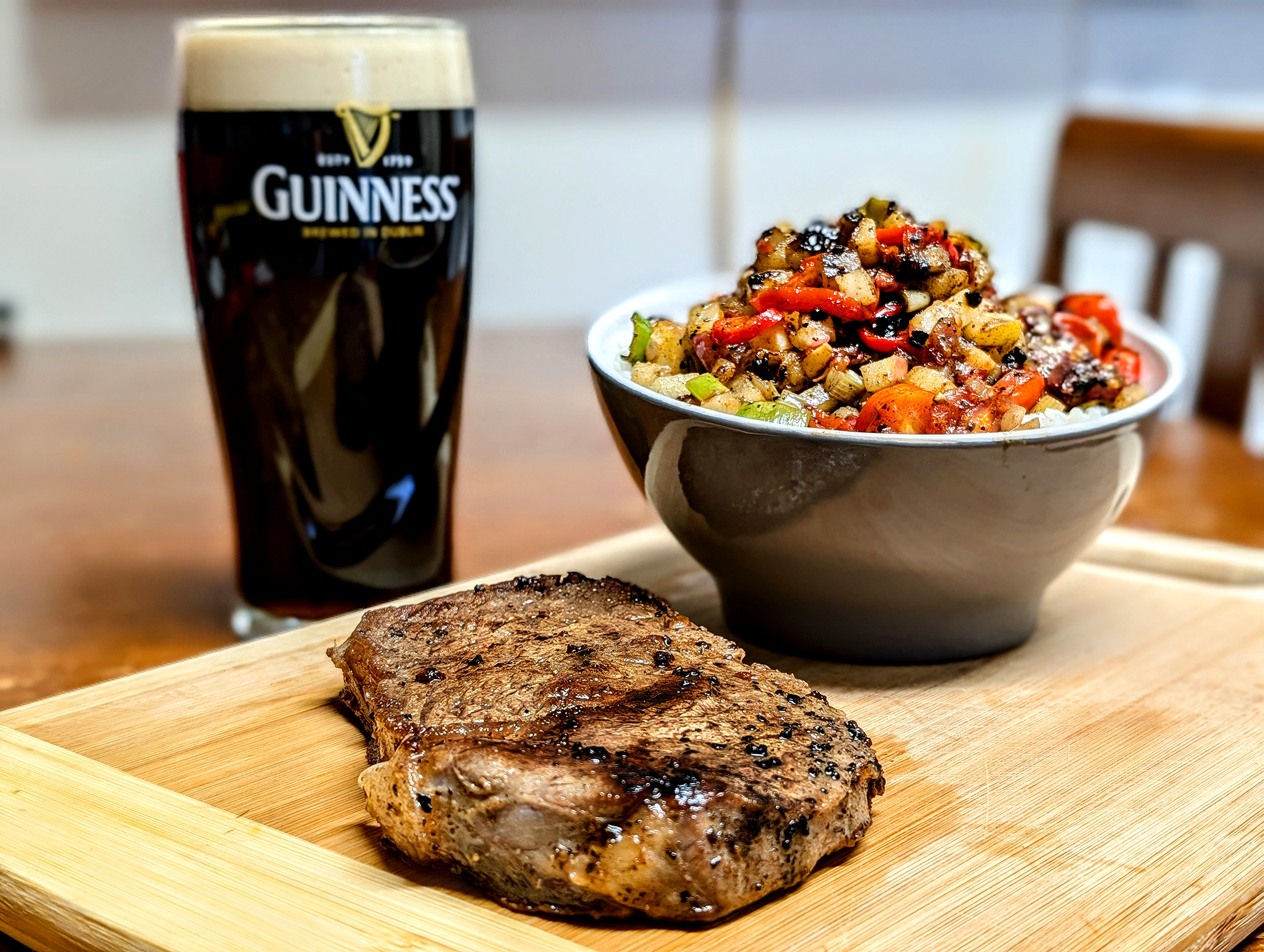 Charcoal seared ribeye, fried mango pear salsa over rice, and a ...