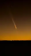 Comet over sunset.