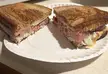 Cooked at home corned beef, swiss cheese, coleslaw, and Russian dressing on a butter marble rye. 