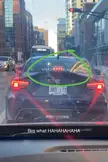 Coomer Mobile: rear view of a dark blue Toyota on a city street with an XVIDEOS.com sticker on the back window