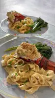 Creamy Cajun lobster Alfredo w/ a side of broccolini *chefs kiss*