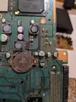 cleaning out the inside of a PS2, the CMOS battery is stamped with the PlayStation logo