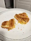 Does a croissant with cheese count as a grilled cheese?