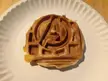 Made out of a hamburger bun on an Avengers waffle iron. Like most MCU movies I would rate a solid 5/10