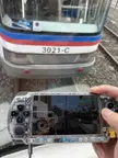 Playing a train simulator on my PSP while riding an actual train