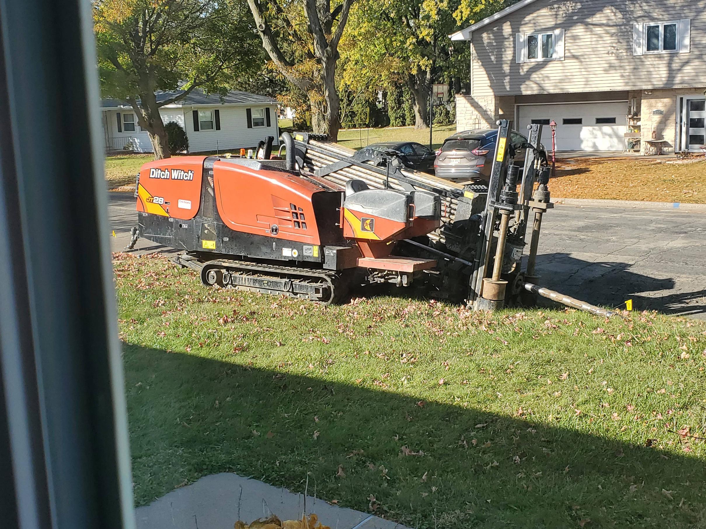 Ditch Witch - directional drill. Used to pull fiber optic conduit on my ...